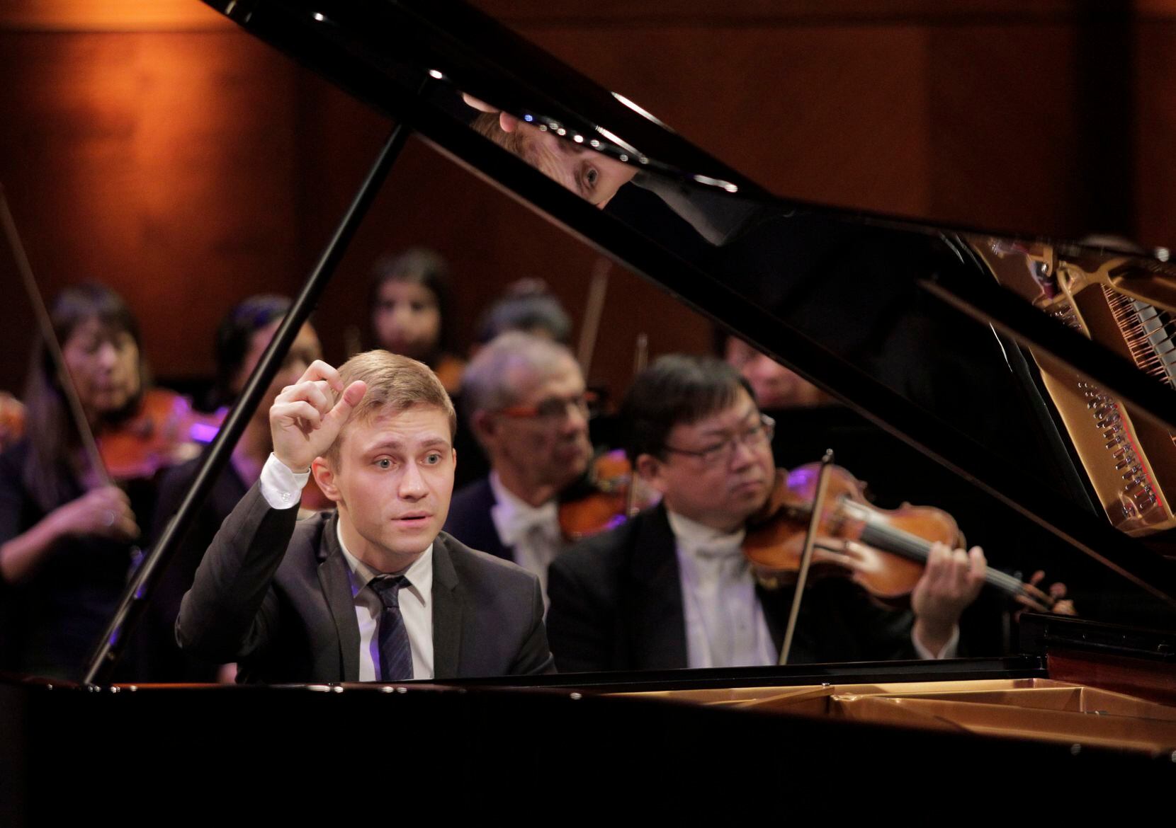 Pianist Dmytro Choni performs with the Fort Worth Symphony Orchestra and guest conductor...