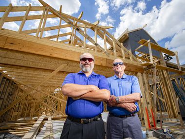 Justin Webb (left), owner of Altura Homes, and Donnie Evans, president of the company, said they haven't furloughed any workers despite the pandemic. They're shown at a home under construction in the Sonoma Verde development in Rockwall.