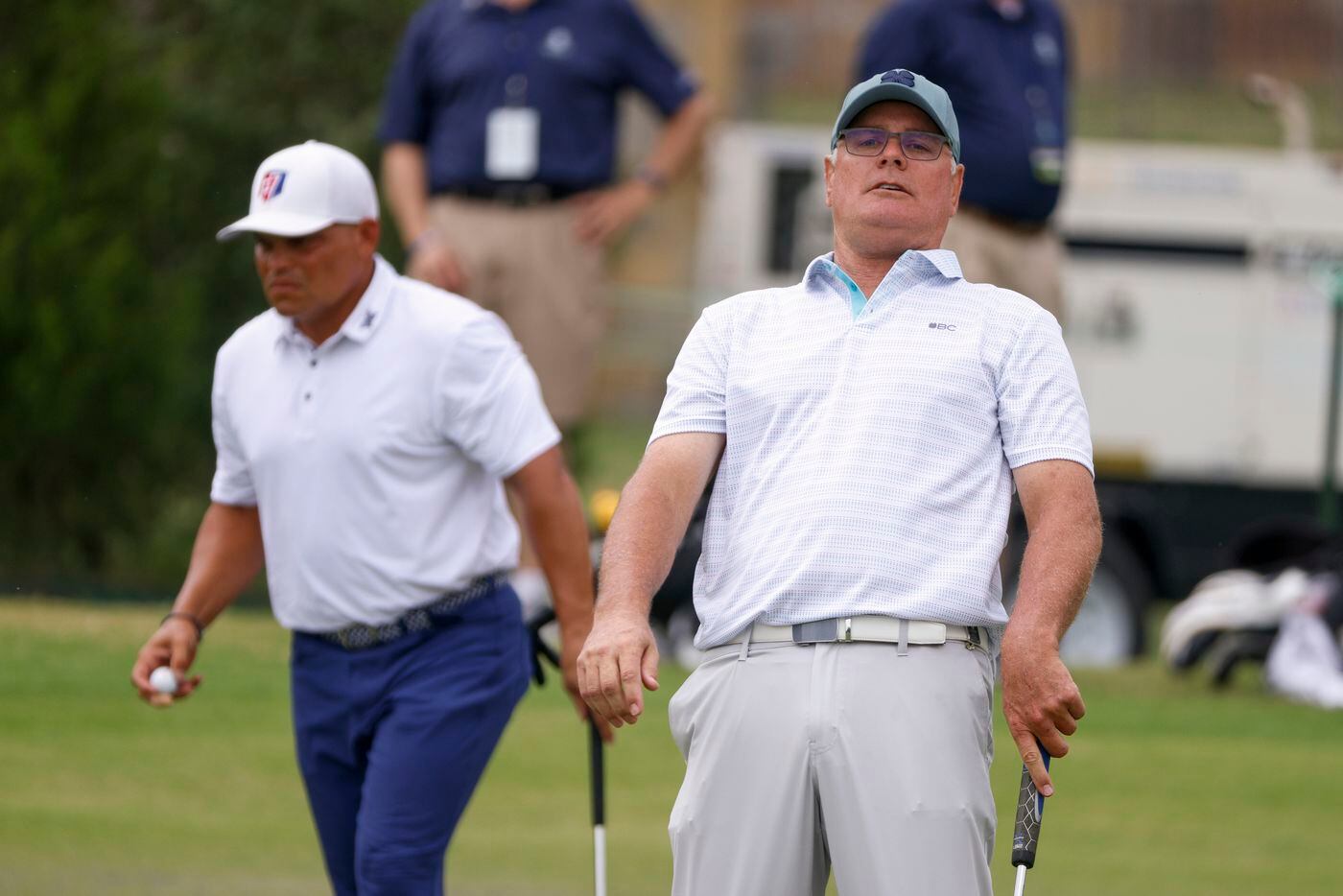 Former MLB pitcher Kenny Rogers reacts after missing a putt on the 16th green during the...