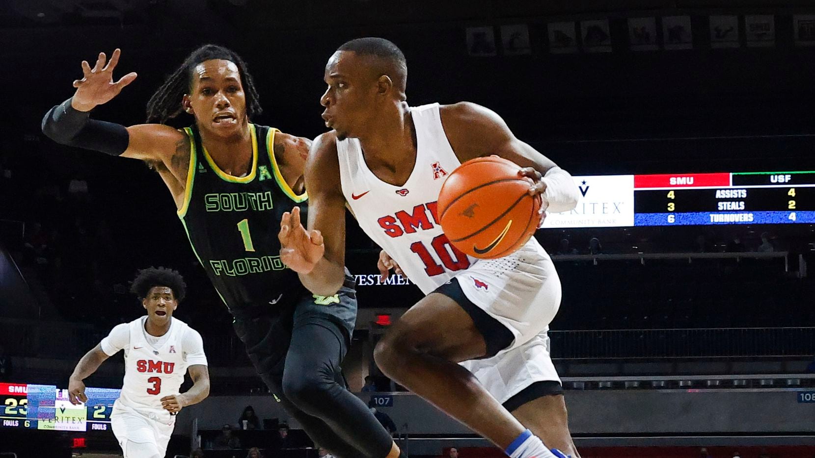 Southern Methodist Mustangs guard Zach Nutall (10) breaks to the basket past South Florida...