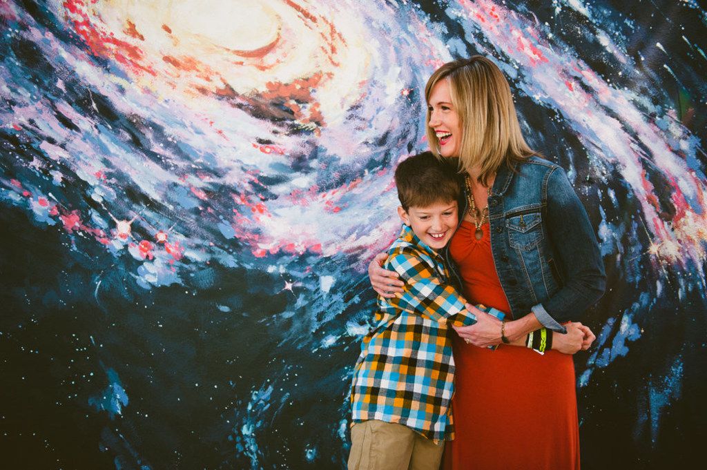 Amber Briggle hugs her 10-year-old transgender son Max.