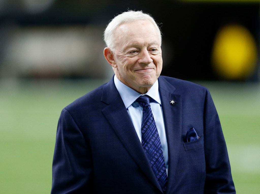 FILE — Dallas Cowboys owner and general manager Jerry Jones smiles on the field before a...