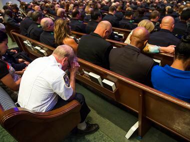 during funeral services for Dallas police Sr. Cpl. Lorne Ahrens at Prestonwood Baptist...