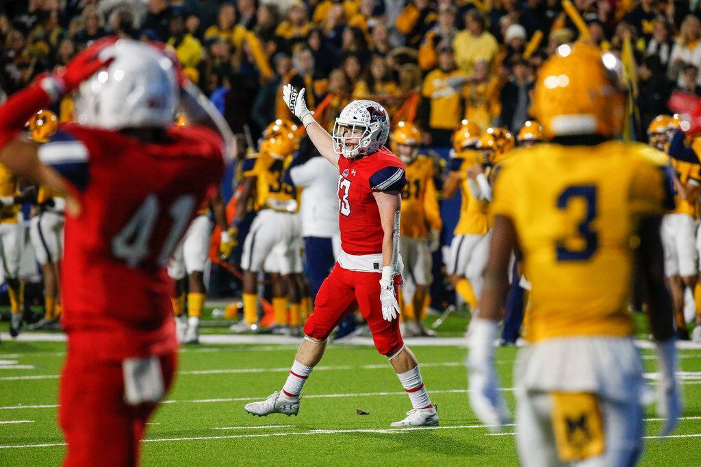 McKinney Boyd's Jake Fex (13) celebrates an interception during the second half of a high...
