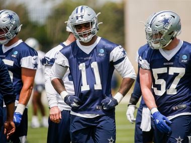 Dallas Cowboys linebacker Micah Parsons (11) and Dallas Cowboys linebacker Luke Gifford (57) take a break between drills during the Cowboys second OTA practice on Thursday, June 3, 2021, at the Star in Frisco.