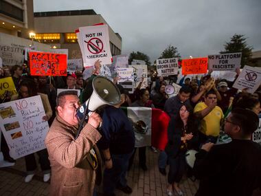Demonstrators opposed to speaker Richard Spencer gather outside the Memorial Student Center...