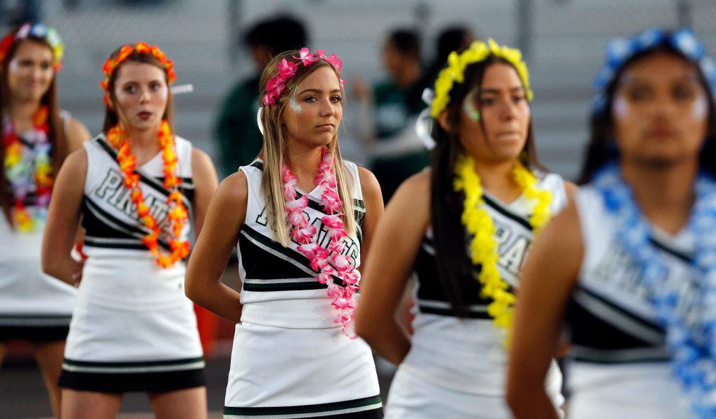 The Mesquite Poteet high cheerleaders sported their Hawaiian theme adornments during the...