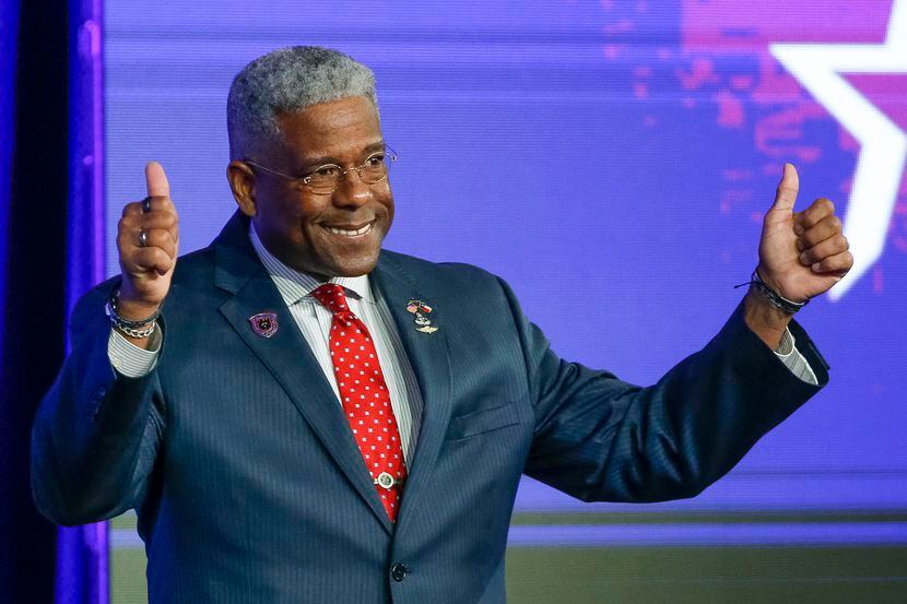 Former Texas Republican Party chairman Allen West gives a thumbs up to the crowd before...