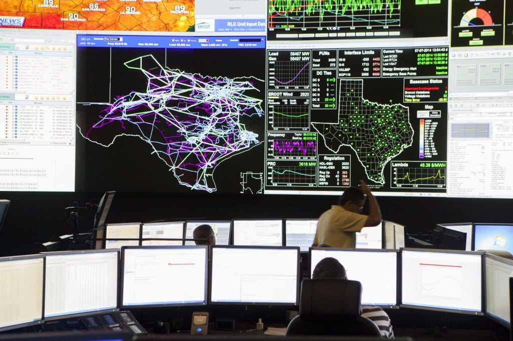 The control room of a power grid control center operated by the Electric Reliability Council...
