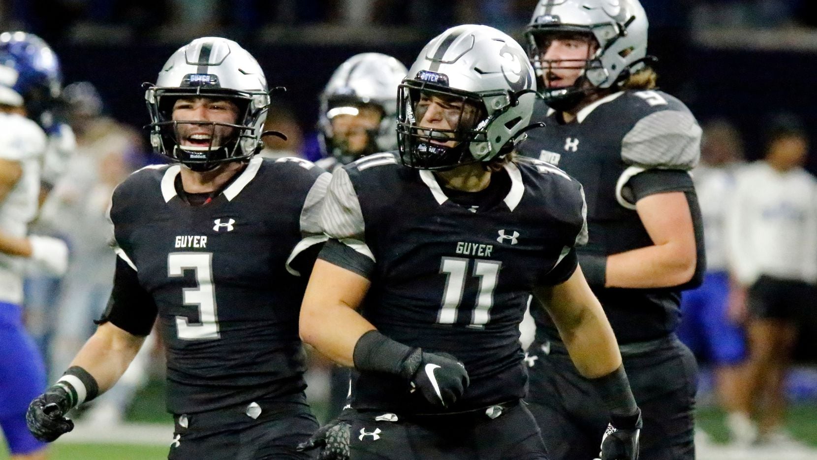 Guyer High School linebacker Carson Parham (11) celebrates his interception which would lead to a score during the first half as Denton Guyer High School played Trophy Club Byron Nelson High School in a Class 6A Division II Region I semifinal football game at The Ford Center in Frisco on Saturday, November 27, 2021.