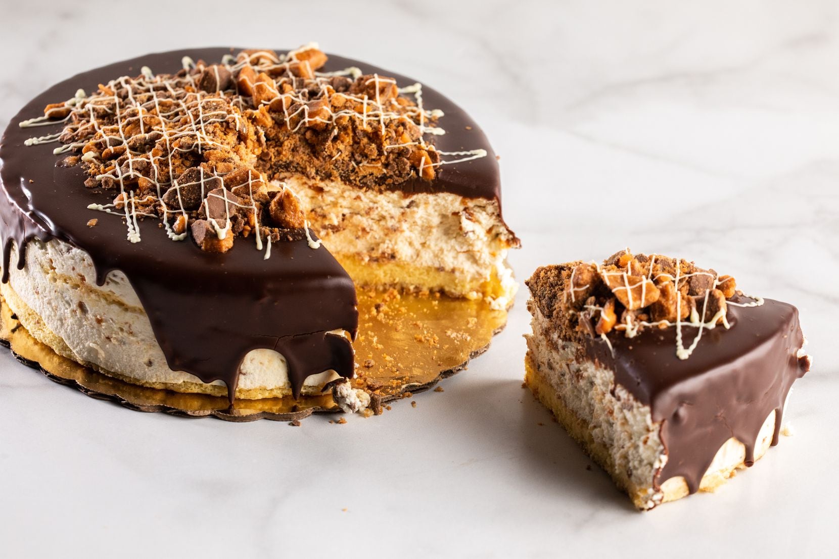 Eatzi's Market and Bakery is offering a Butterfinger white chocolate cake beginning June 19...