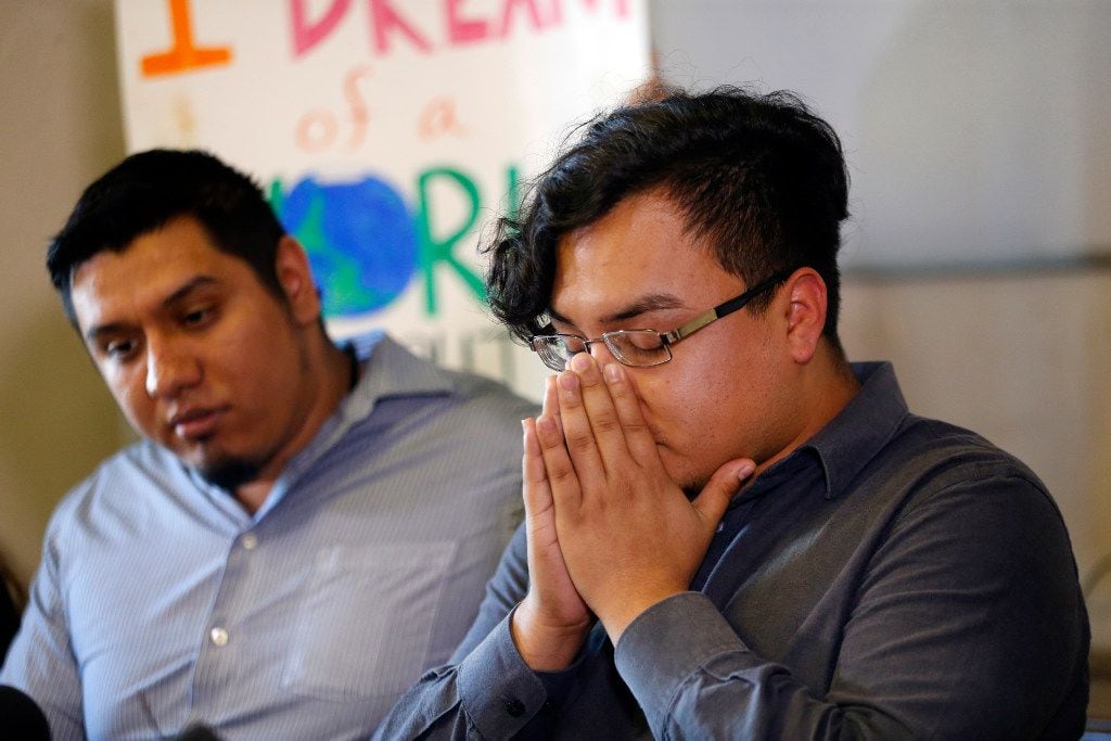 Edwin Romero, a Mexican immigrant detained by Richardson police and then freed, closes his...