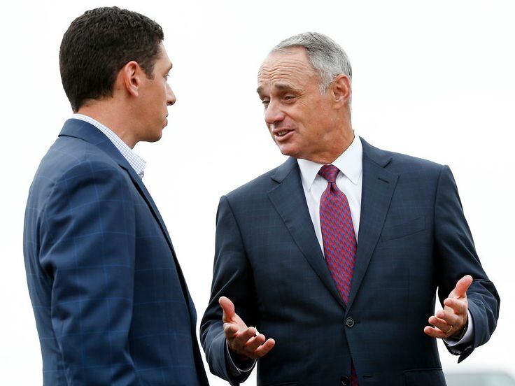 MLB Commissioner Rob Manfred (right) visits with Texas Rangers general manager Jon Daniels before ground breaking ceremonies for the Texas Rangers new $1.1 billion Globe Life Field in Arlington, Texas, Thursday, September 28, 2017.
