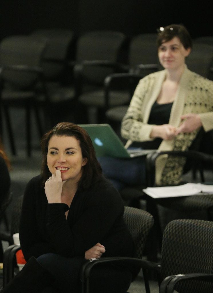 Ashley H. White (left), co-founder and co-artistic director of Imprint Theatreworks, watches...