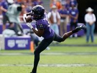 TCU Horned Frogs wide receiver Derius Davis (11) makes a leaping catch during the first half...