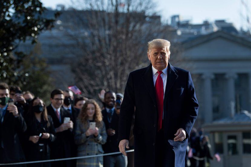 President Donald Trump walked by supporters outside the White House on Jan. 12. (Brendan...