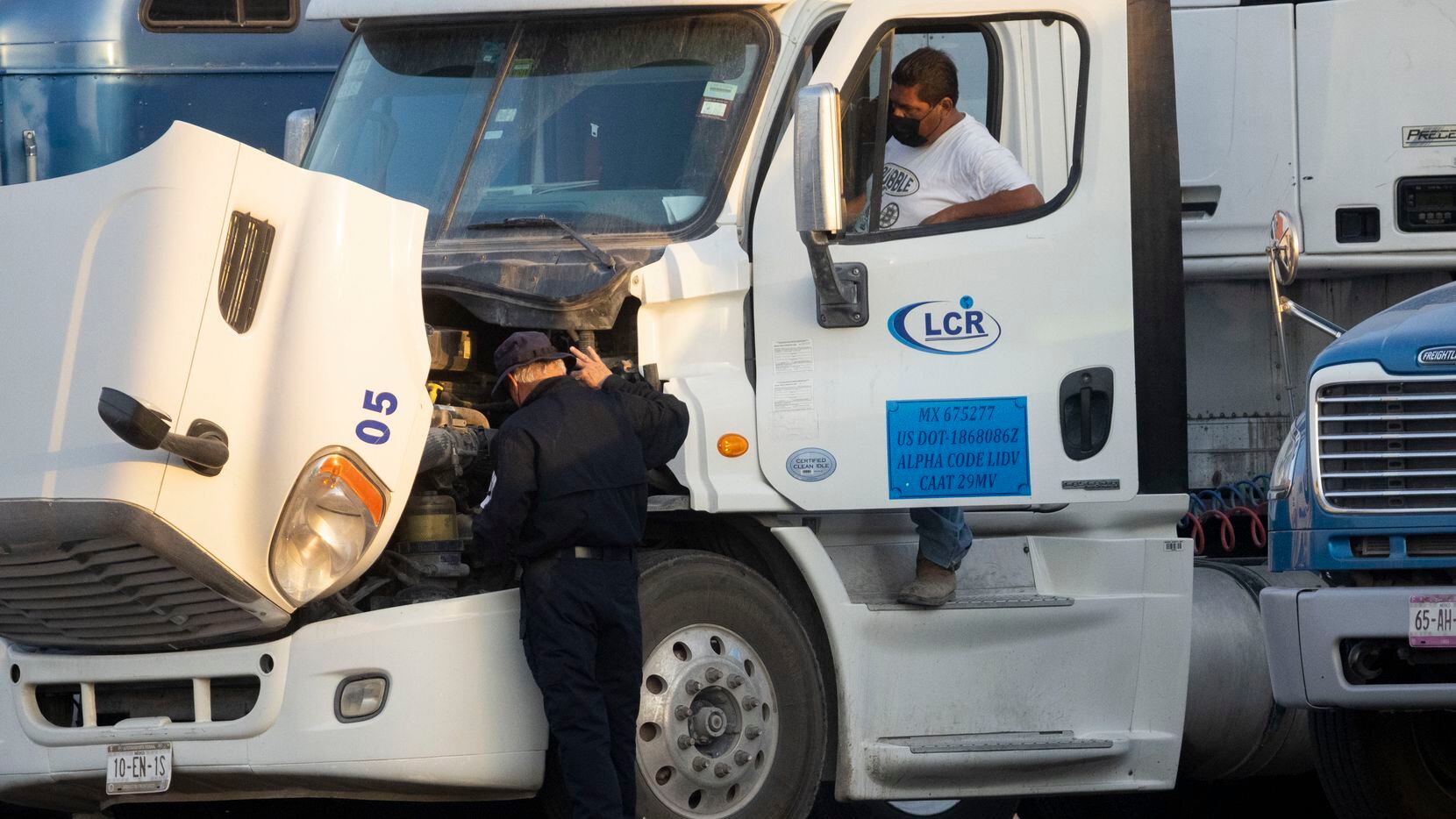 A Texas State Trooper commercial motor vehicle inspects trucks near the Pharr–Reynosa...