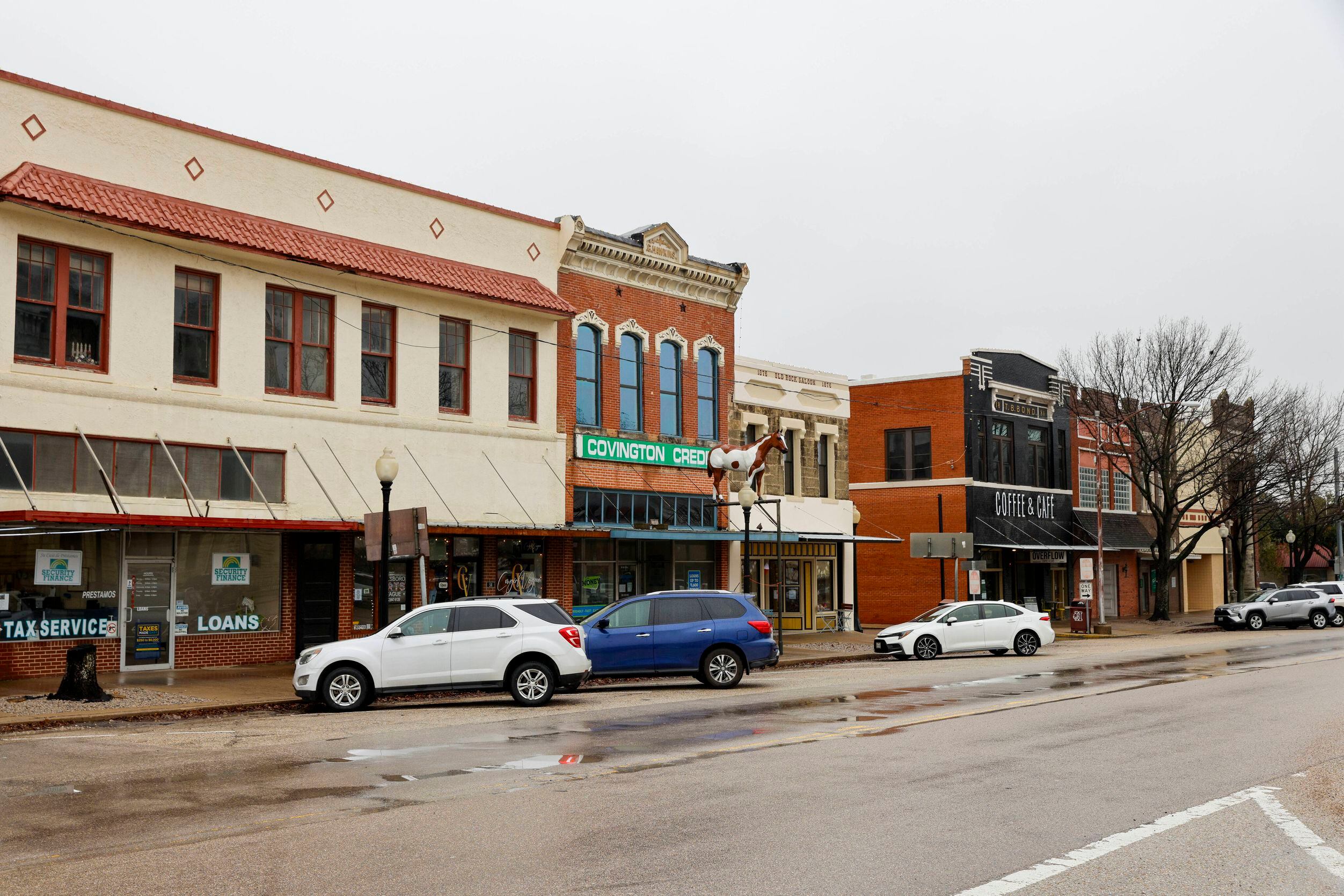 Various businesses and buildings are seen in the square, Tuesday, Jan. 23, 2024, in...