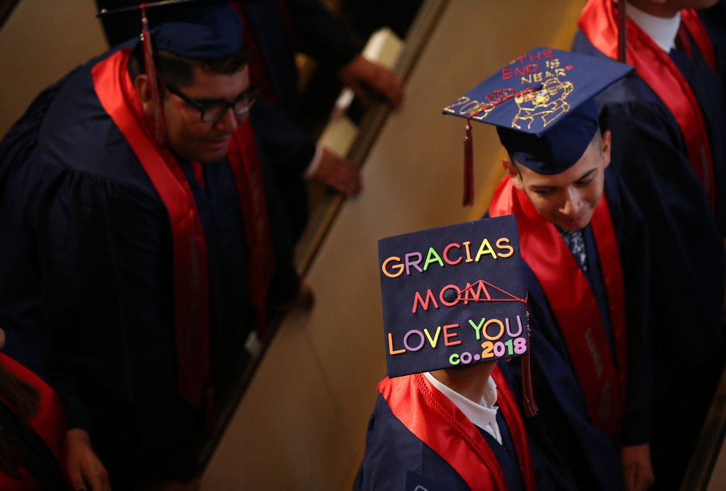 A graduate adorned his mortarboard with a message to his mother during a commencement...