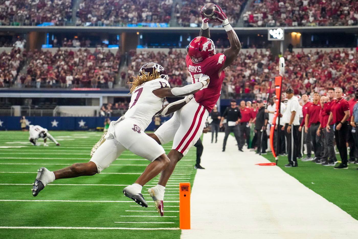 Arkansas wide receiver Treylon Burks (16) can’t come down in bounds on a pass near the goal...