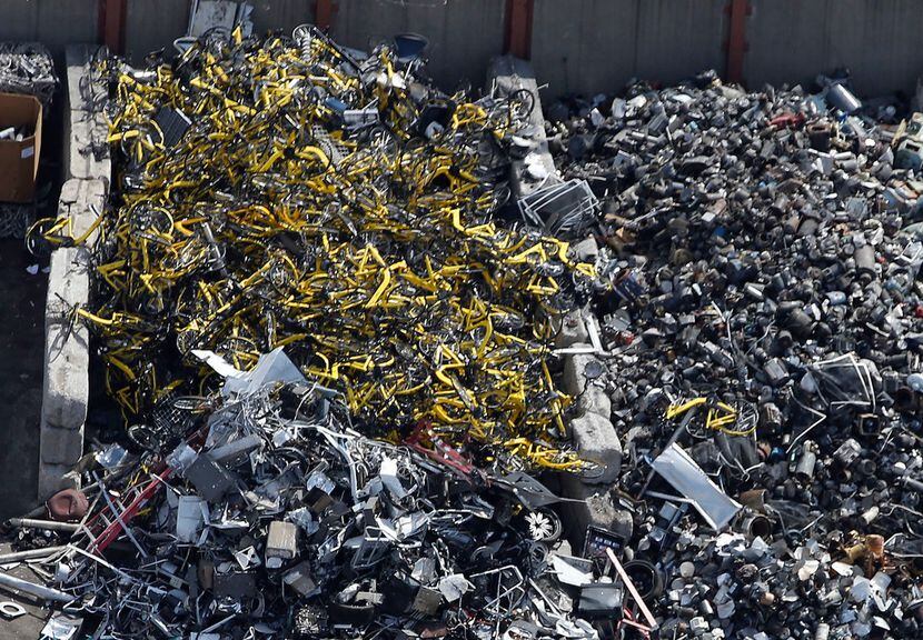 Hundreds of Ofo rental bikes were found at CMC Recycling in Dallas on Aug. 6, 2018. 