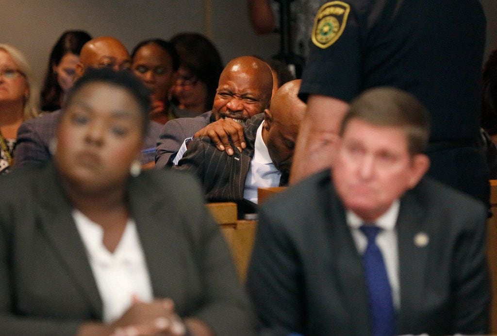People in the courtroom react to a guilty verdict during the ninth day of the trial of fired Balch Springs police officer Roy Oliver, who was charged with the murder of 15-year-old Jordan Edwards, at the Frank Crowley Courts Building in Dallas on Tuesday.