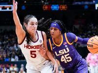 LSU's Alexis Morris drives past Virginia Tech's Georgia Amoore during the first half of an...