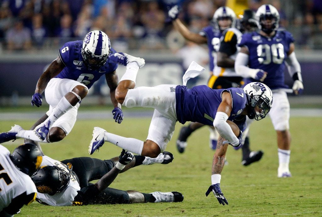 FILE - TCU safety Trevon Moehrig (7) dives for yards after returning an interception in the...