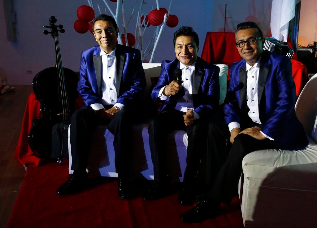Miembros de la banda de cumbia Los Ángeles Azules posan durante una entrevista con The...