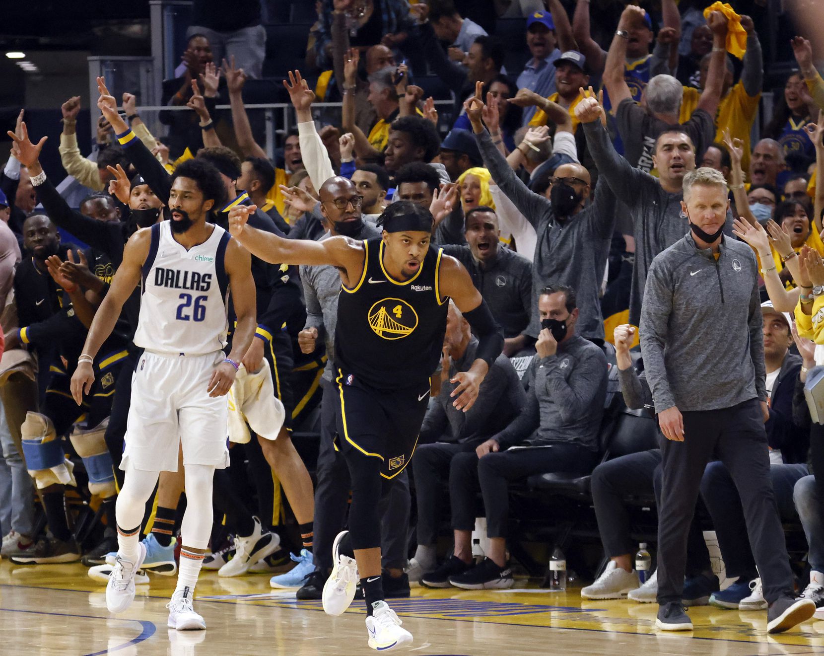 Golden State Warriors guard Moses Moody (4) celebrates his second quarter three-pointer in...