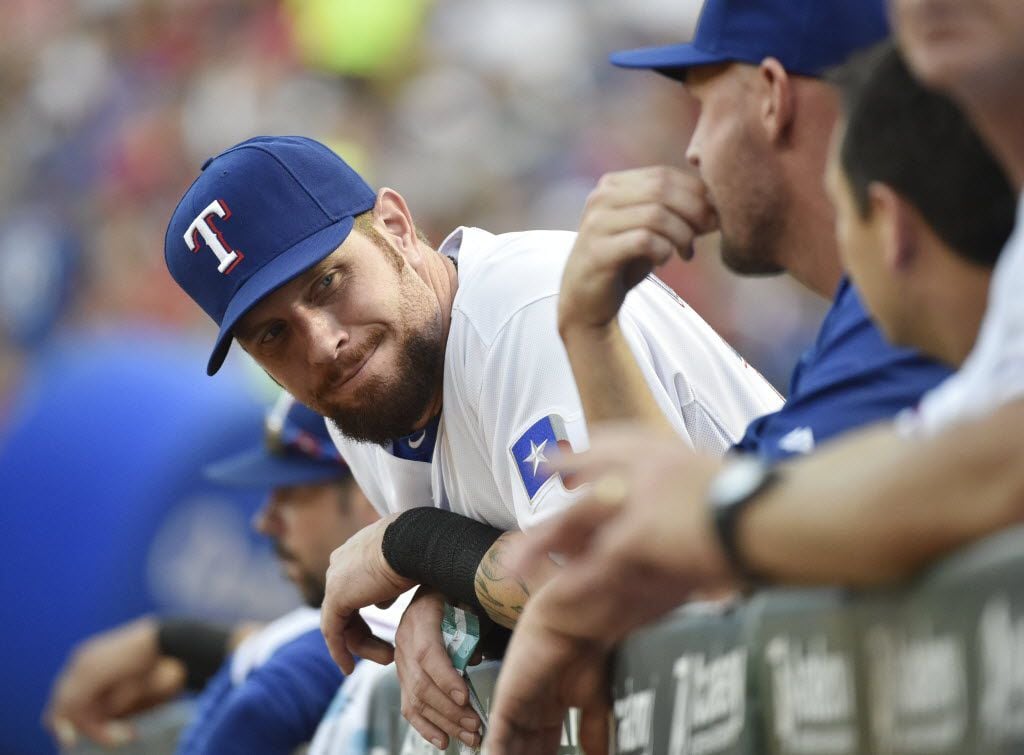 Texas Rangers left fielder Josh Hamilton (32), on the bench,during their baseball game...