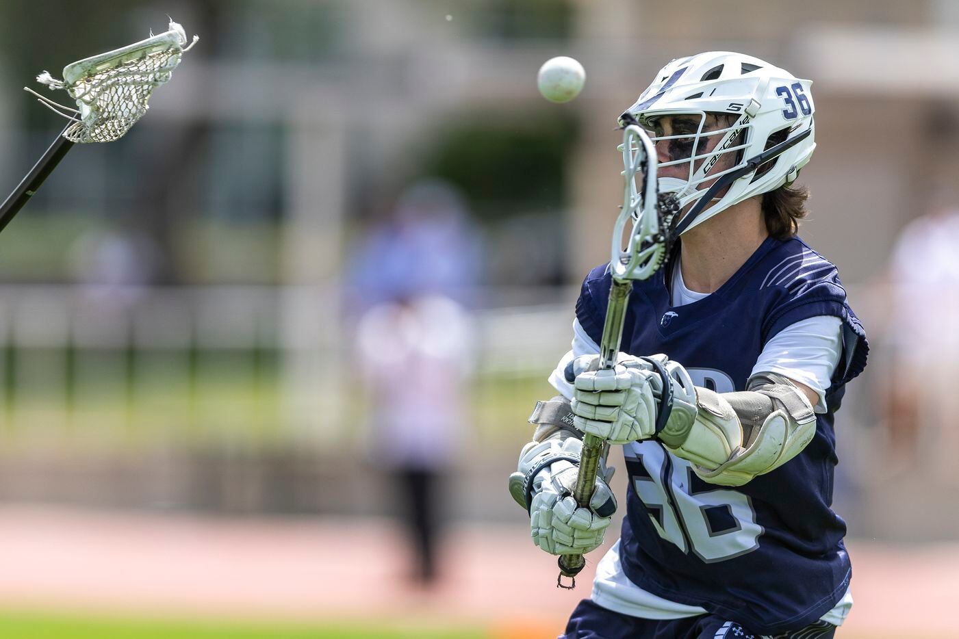 Episcopal School of Dallas’ Jack Whitham (36) takes a shot on goal against St. Mark's during...
