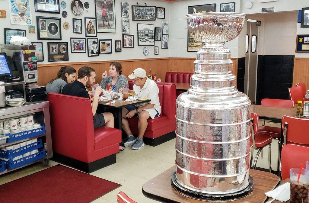 The Stanley Cup sits on a table at Norma's Cafe in Dallas as patrons eat lunch. The Keeper...