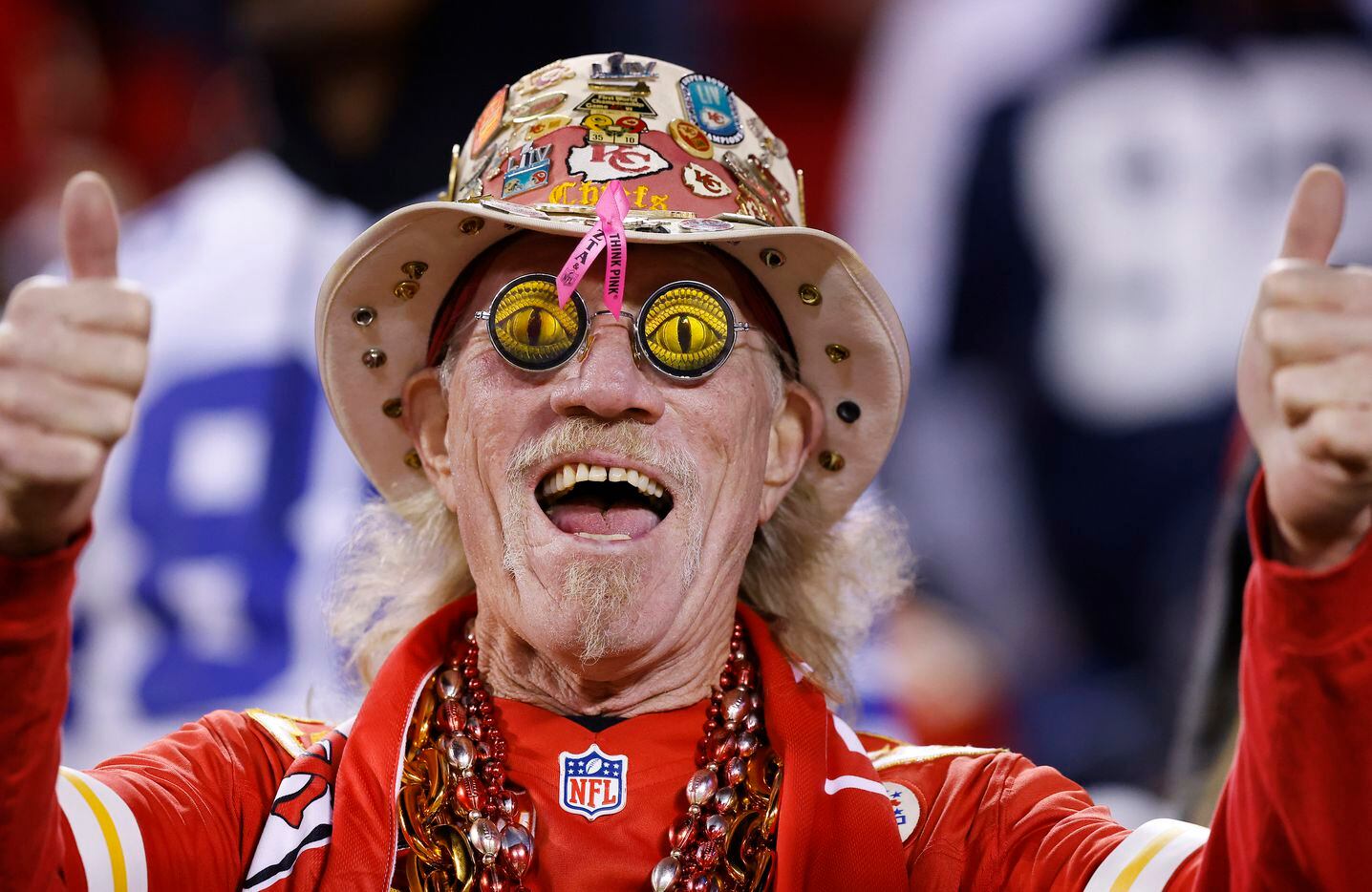 A Kansas City Chiefs fans gives a thumbs up to his team beating the Dallas Cowboys in the...