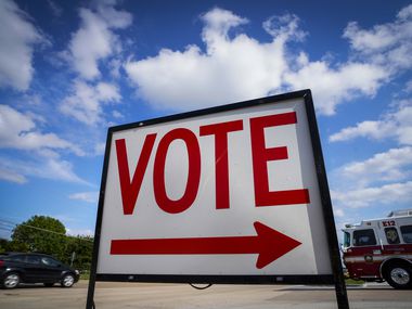 Traffic passes a polling place sign outside a Collin County Early Voting Location at Carpenter Park Recreation Center on Monday, June 29, 2020, in Plano. Monday was the first day for early voting for the July 14 primary runoff election.(Smiley N. Pool/The Dallas Morning News)