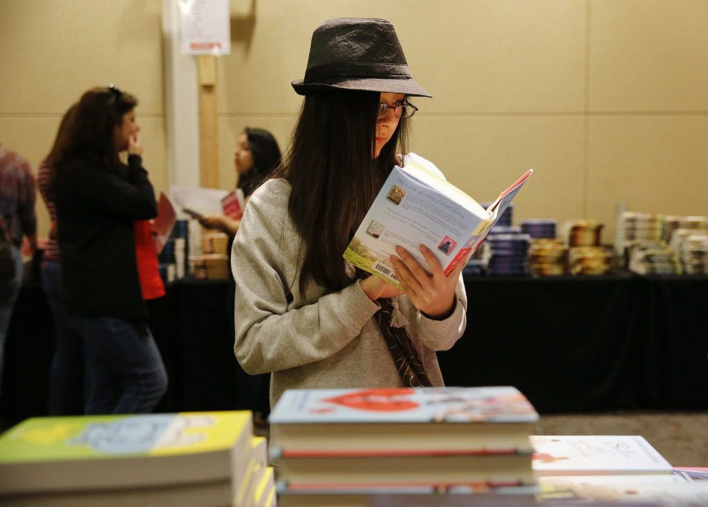 Daja Shelton, 13, of Granbury, checked out a book during the inaugural North Texas Teen Book...