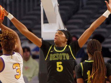 DeSoto senior Sa' Myah  Smith (5) defends a shot by Montverde forward Janiah Barker (3) during first half action. The two teams played their basketball game as part of the Thanksgiving Hoopfest which was held at Dickies Arena In Fort Worth on November 27, 2021.