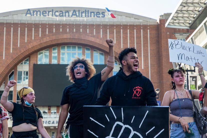 Miguel Ibarra (center right) joined other protesters during a June 4 demonstration at...