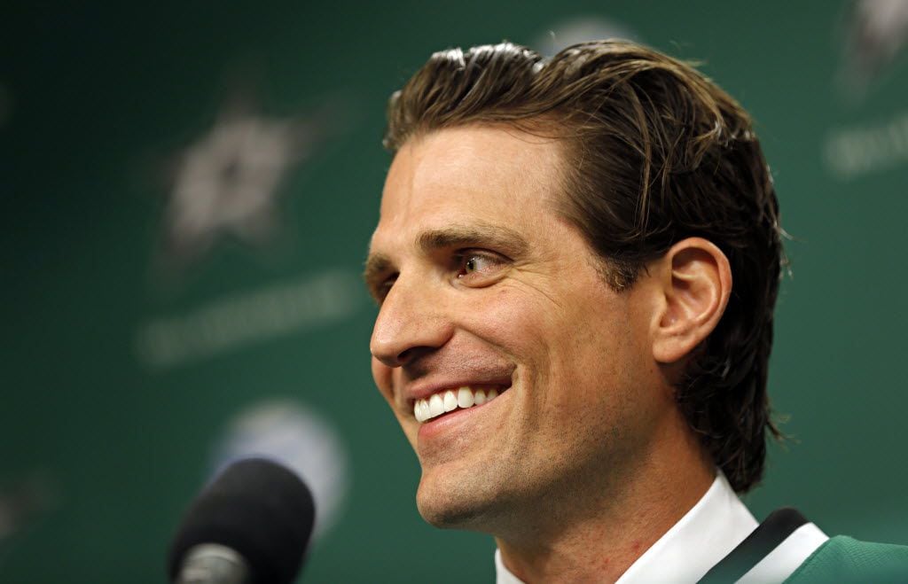 New Dallas Stars wing Patrick Sharp smiles as he speaks to media during a press conference...