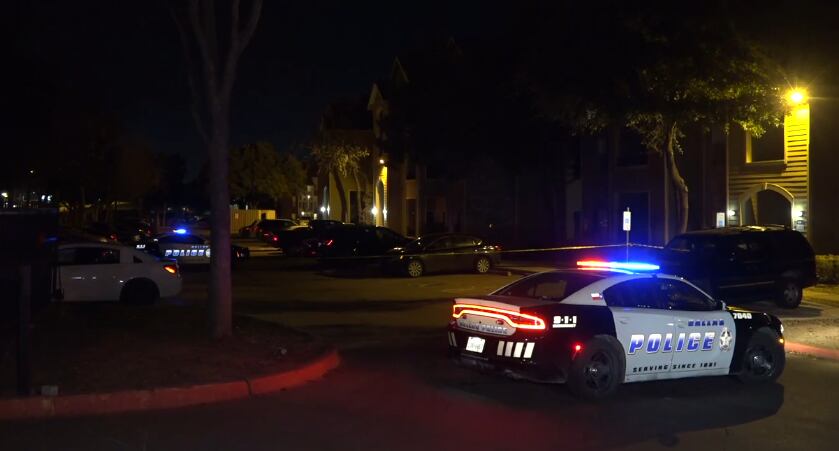 Dallas police taped off the scene at a Red Bird apartment complex where the robbery and...