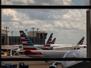 Planes from American Airlines outside of Terminal B at DFW International Airport, on Thursday, July 23, 2020.