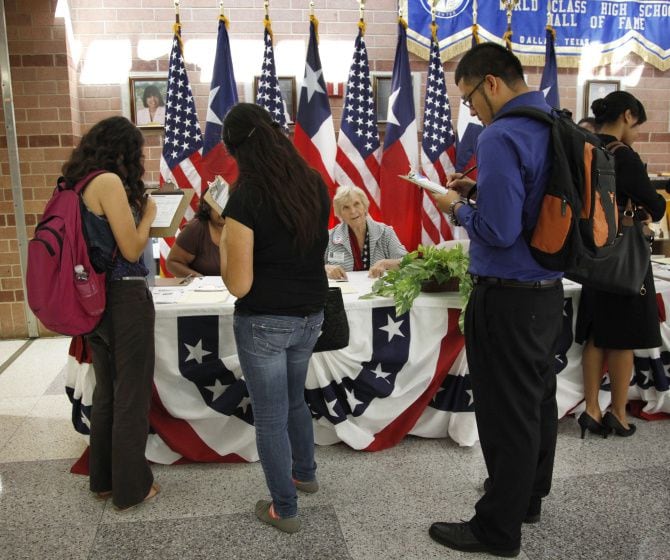 Students (from left) Amairani Ayala, Jennifer Chantaca and Roger Camacho registered to vote...