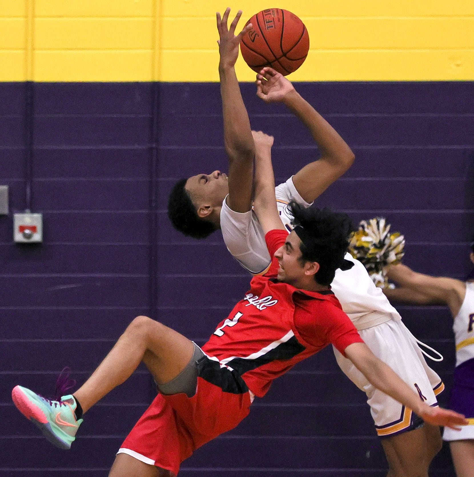 Richardson guard Rylan Griffen collides with Coppell guard Devank Rane (2) during the second half of a 6A nondistrict boys high school basketball game played on December 7, 2021 at Richardson High School in Richardson.  (Steve Nurenberg/Special Contributor)