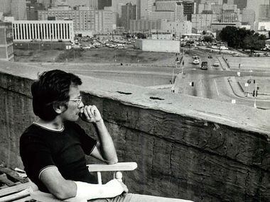 Sept. 23, 1979: Gordon Bellamy enjoys the view of the Dallas skyline from the roof of the...
