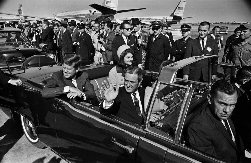 Pres. John F. Kennedy, Jacqueline Kennedy, and Texas Gov. John Connally begin the motorcade...
