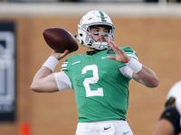 North Texas quarterback Austin Aune throws a pass during the first half of the team's NCAA...