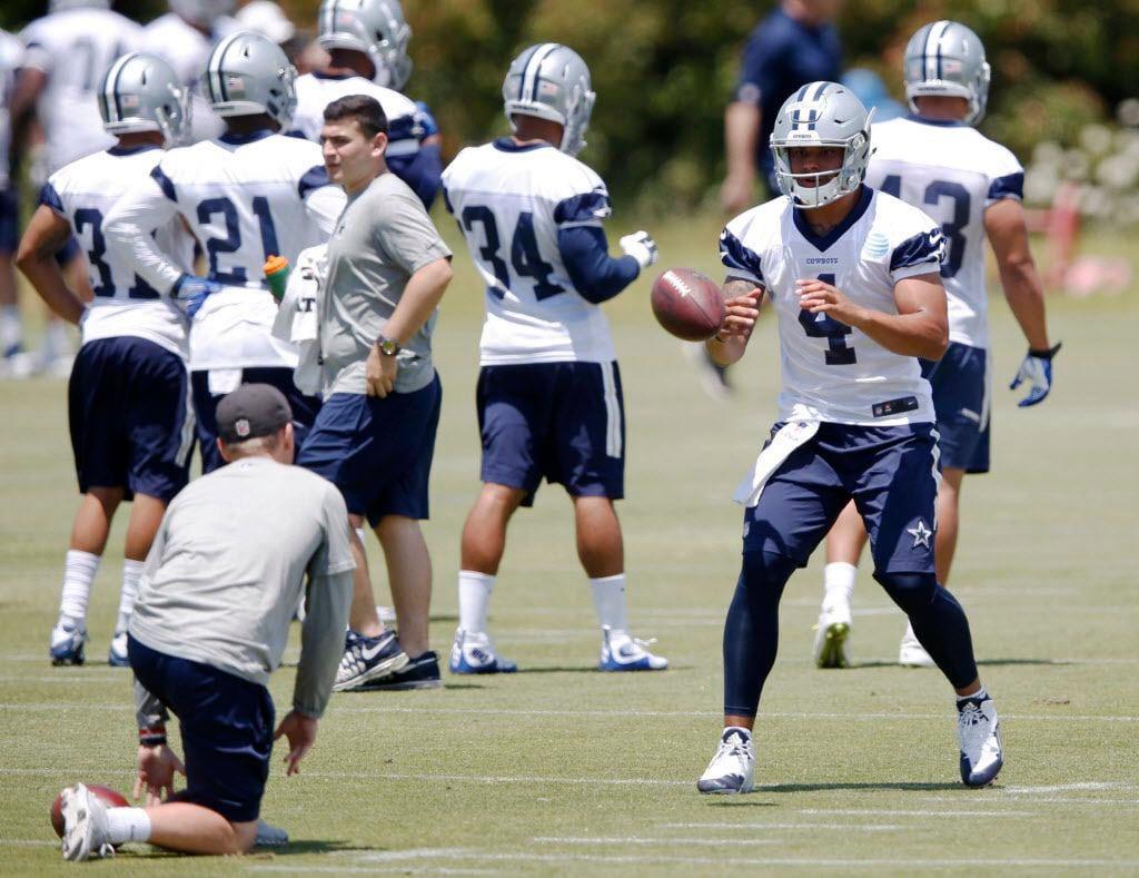 Dallas Cowboys Dak Prescott (4) prepares to catch the ball on a play during rookie minicamp...