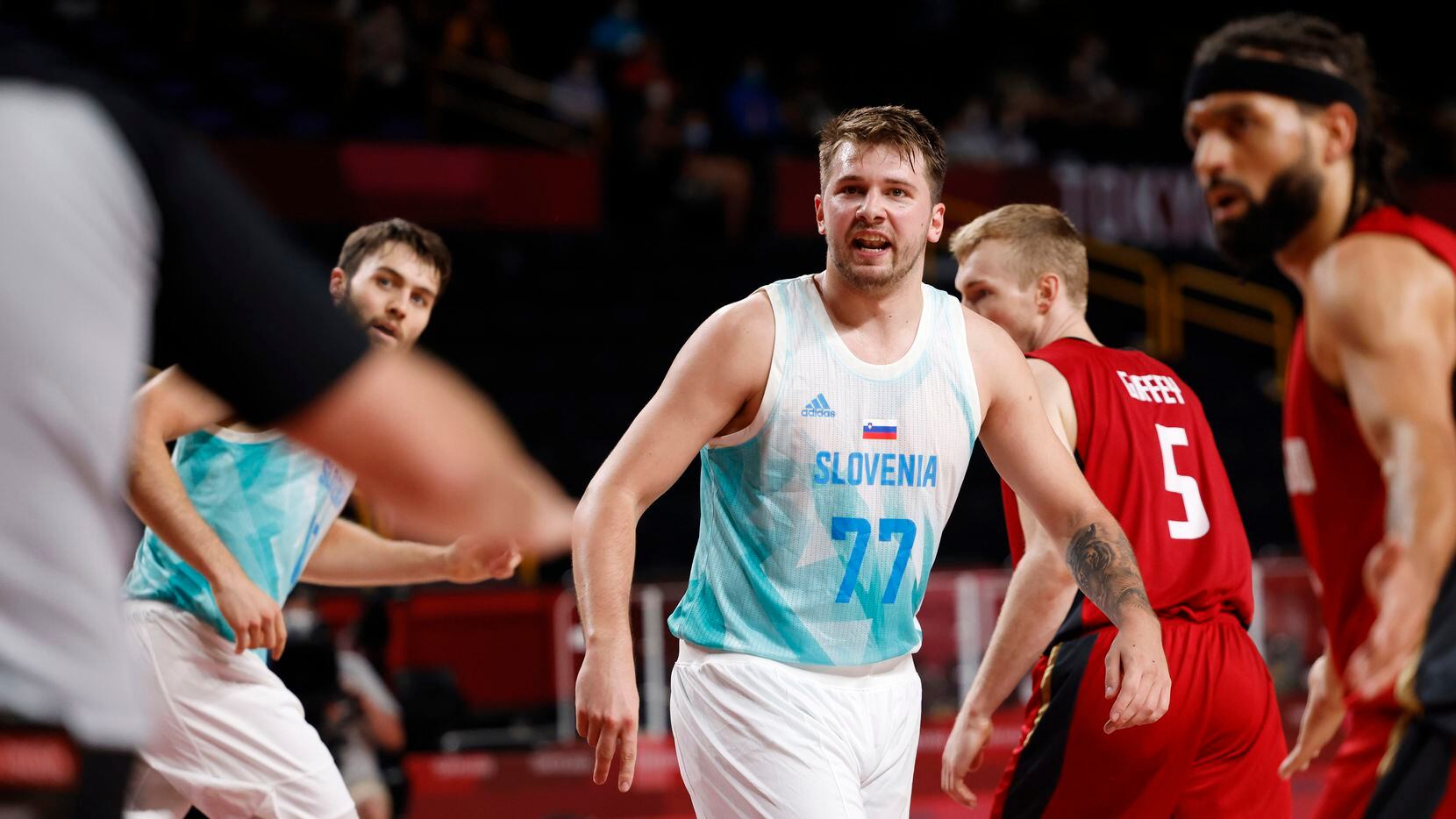 Slovenia’s Luka Doncic (77) looks for the foul call after a made basket in play against...