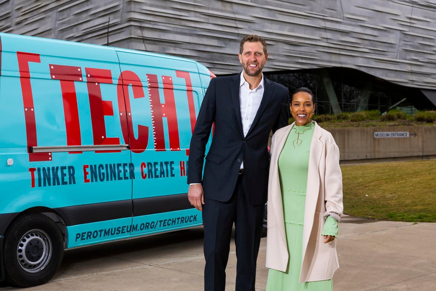 Dirk and Jessica Nowitzki pose in front of a Tech Truck at the Perot Museum of Nature and...