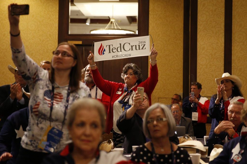Maggie Wright stood to support Ted Cruz as he spoke to Texas delegates Thursday morning.   